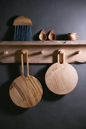 Shelf of wooden products from Slow Made Goods